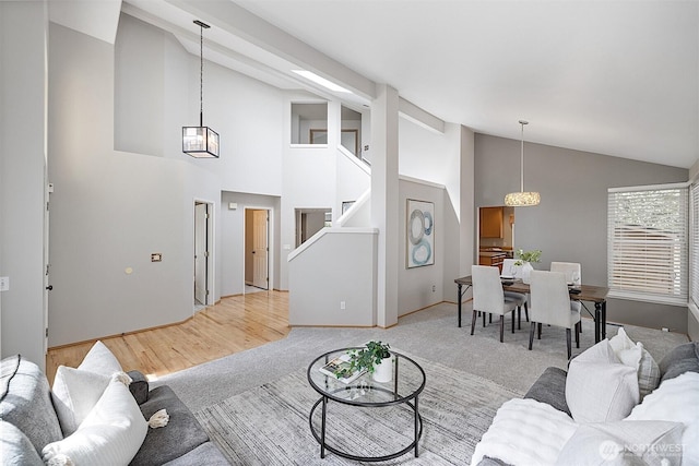 30515 127th Pl SE, Auburn, WA 98092 - carpeted living area with high vaulted ceiling and stairs