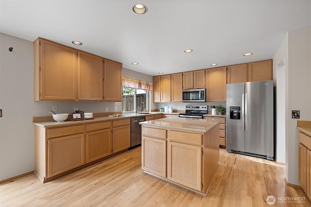 30515 127th Pl SE, Auburn, WA 98092 - kitchen with stainless steel appliances, a sink, light countertops, light wood-style flooring, and recessed lighting