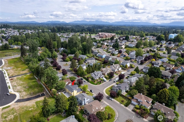 30515 127th Pl SE, Auburn, WA 98092 - aerial overview of property's location with a mountain backdrop and nearby suburban area