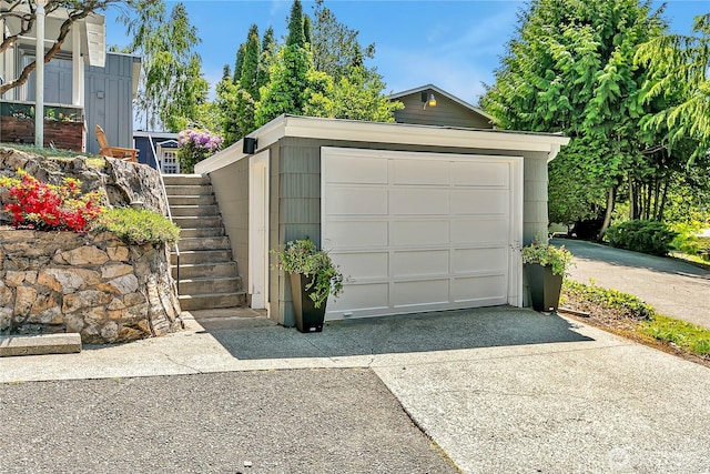 9024 29th St W, University Place, WA 98466 - detached garage featuring driveway