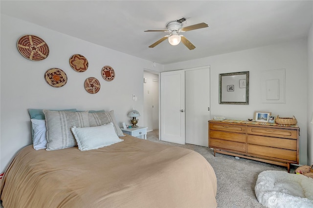 9024 29th St W, University Place, WA 98466 - bedroom with light colored carpet, a closet, and a ceiling fan