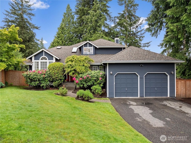 8221 122nd Ave NE, Kirkland, WA 98033 - view of front of house with roof with shingles, asphalt driveway, a garage, and a chimney