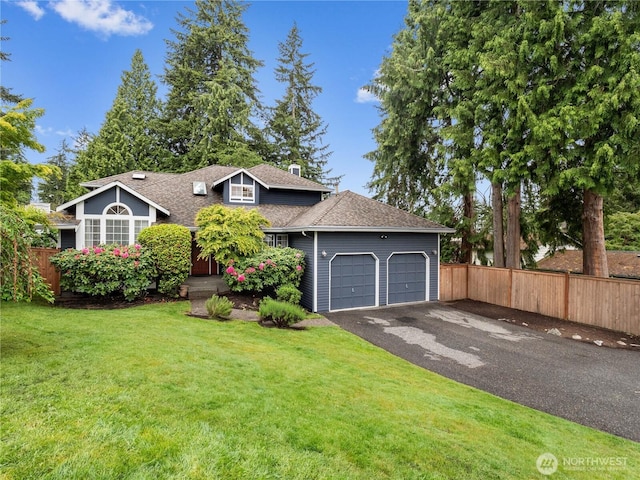 8221 122nd Ave NE, Kirkland, WA 98033 - view of front of house with a garage, asphalt driveway, roof with shingles, and a chimney