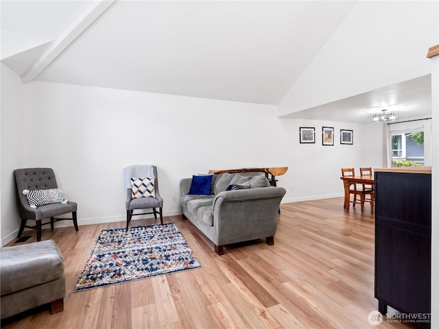 8221 122nd Ave NE, Kirkland, WA 98033 - living room with vaulted ceiling, light wood-type flooring, and baseboards