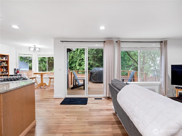8221 122nd Ave NE, Kirkland, WA 98033 - bedroom featuring access to outside, light wood finished floors, and recessed lighting