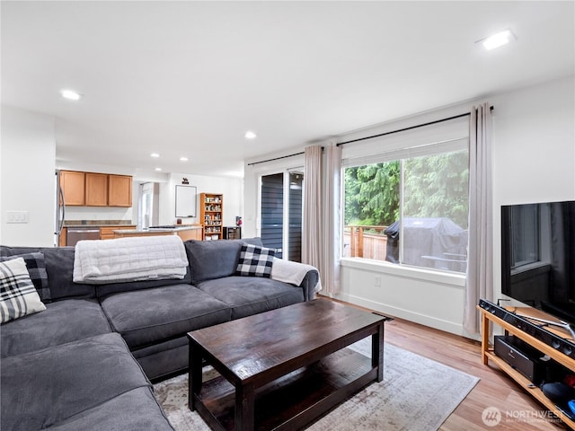 8221 122nd Ave NE, Kirkland, WA 98033 - living area featuring light wood-type flooring and recessed lighting