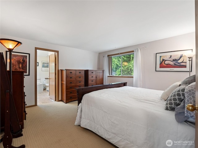 8221 122nd Ave NE, Kirkland, WA 98033 - bedroom with light carpet and ensuite bathroom