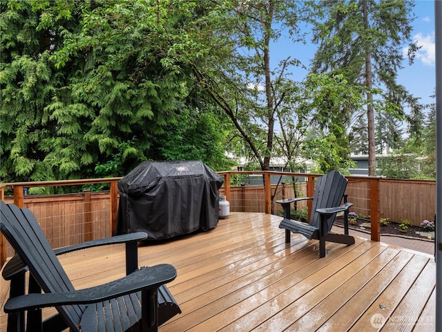 8221 122nd Ave NE, Kirkland, WA 98033 - wooden terrace with grilling area and a fenced backyard