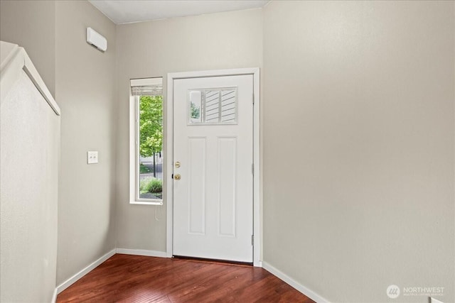 21421 104th Street Ct E, Bonney Lake, WA 98391 - entrance foyer with baseboards, plenty of natural light, and wood finished floors