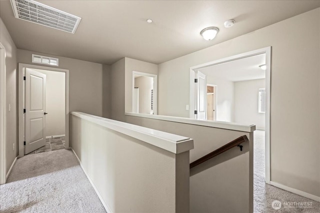 21421 104th Street Ct E, Bonney Lake, WA 98391 - hallway with carpet floors, an upstairs landing, and baseboards