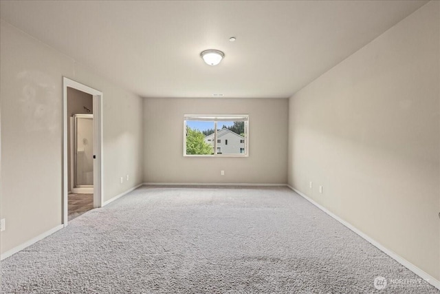 21421 104th Street Ct E, Bonney Lake, WA 98391 - carpeted spare room with baseboards
