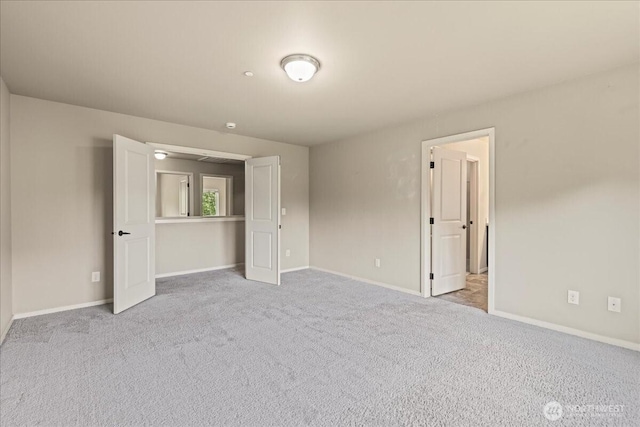 21421 104th Street Ct E, Bonney Lake, WA 98391 - unfurnished bedroom with carpet and baseboards