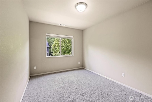 21421 104th Street Ct E, Bonney Lake, WA 98391 - carpeted spare room featuring baseboards