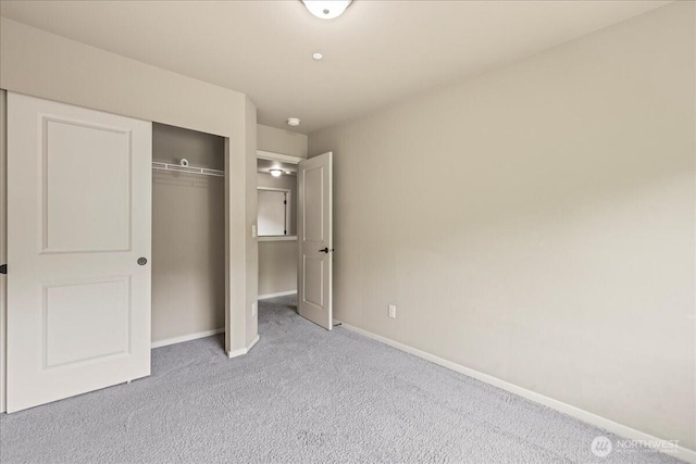 21421 104th Street Ct E, Bonney Lake, WA 98391 - unfurnished bedroom featuring carpet flooring, baseboards, and a closet