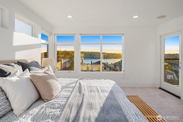 2222 Broadway E, Seattle, WA 98102 - bedroom with carpet flooring, multiple windows, recessed lighting, and baseboards