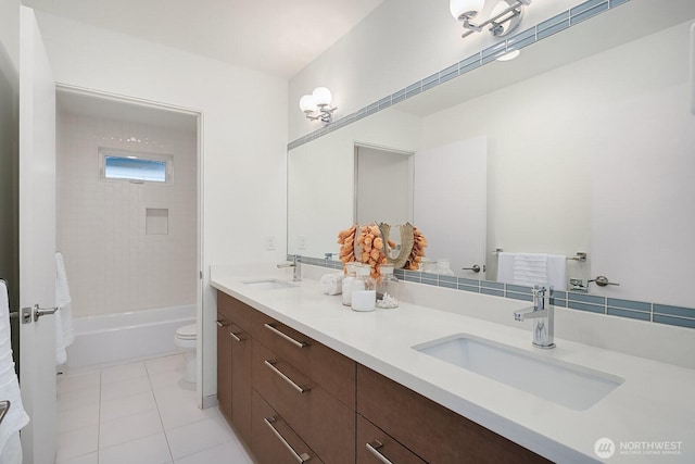 2222 Broadway E, Seattle, WA 98102 - full bath featuring toilet, double vanity, tile patterned floors, and shower / tub combination