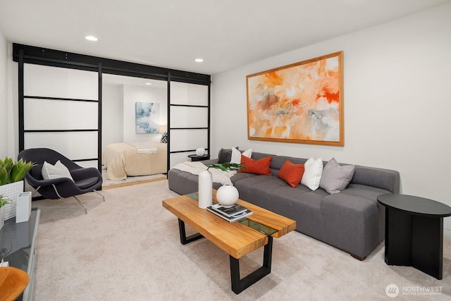 2222 Broadway E, Seattle, WA 98102 - living room featuring a barn door, carpet flooring, and recessed lighting