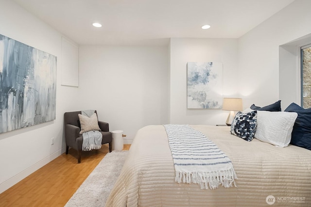 2222 Broadway E, Seattle, WA 98102 - bedroom featuring wood finished floors, recessed lighting, and baseboards