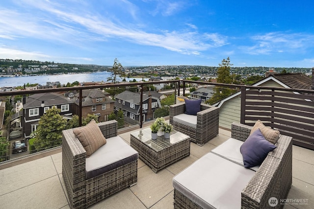 2222 Broadway E, Seattle, WA 98102 - view of patio featuring a water view, an outdoor hangout area, and a balcony