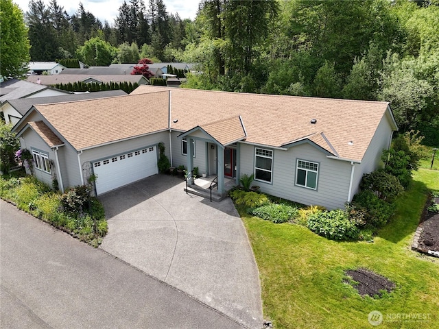 6614 241st Ave E Unit 38, Buckley, WA 98321 - ranch-style home with a garage, concrete driveway, a front yard, and roof with shingles
