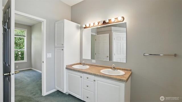 6614 241st Ave E Unit 38, Buckley, WA 98321 - full bath with double vanity and baseboards