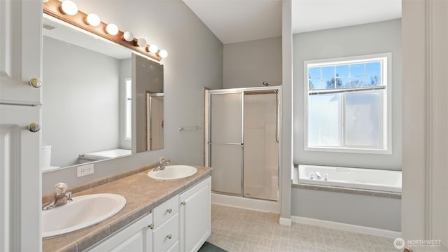 6614 241st Ave E Unit 38, Buckley, WA 98321 - full bathroom featuring a stall shower, double vanity, and a bath