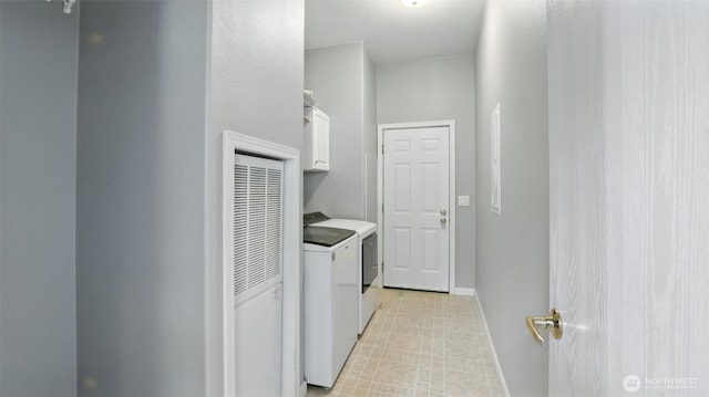6614 241st Ave E Unit 38, Buckley, WA 98321 - laundry area with cabinet space, a heating unit, and washing machine and clothes dryer