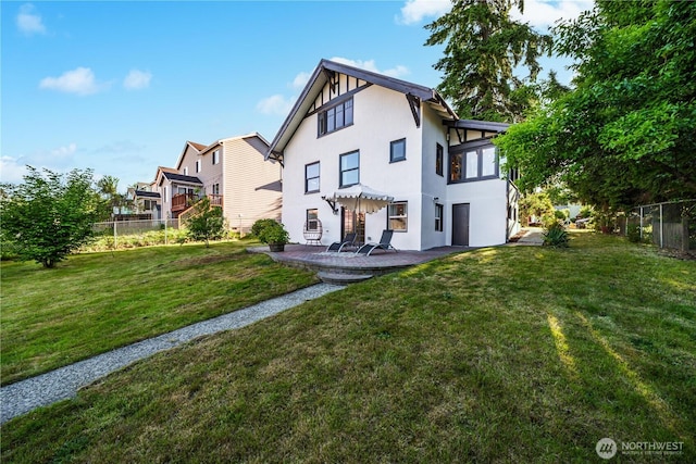 9316 7th Ave S, Seattle, WA 98108 - view of front of property featuring stucco siding and a patio area