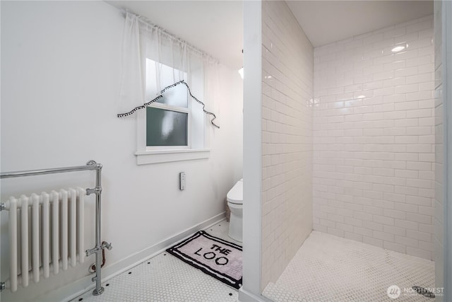 9316 7th Ave S, Seattle, WA 98108 - full bath with radiator, toilet, a stall shower, and baseboards