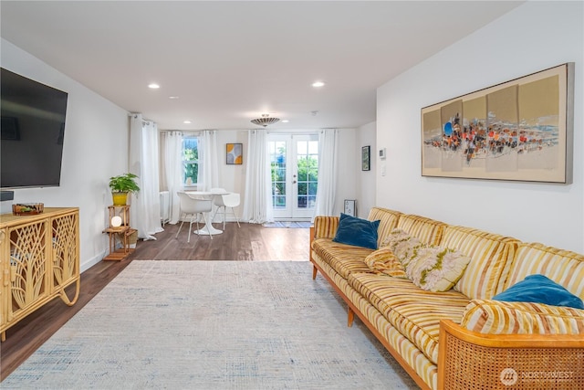 9316 7th Ave S, Seattle, WA 98108 - living area with wood finished floors, recessed lighting, and french doors