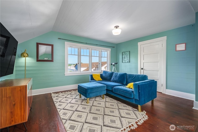 9316 7th Ave S, Seattle, WA 98108 - living area with wood finished floors, baseboards, vaulted ceiling, and wooden walls