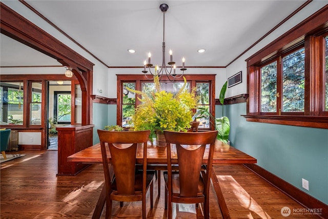9316 7th Ave S, Seattle, WA 98108 - dining area featuring a chandelier, ornamental molding, baseboards, dark wood-style flooring, and recessed lighting
