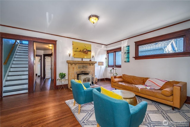 9316 7th Ave S, Seattle, WA 98108 - living room with stairs, ornamental molding, wood finished floors, a fireplace, and baseboards