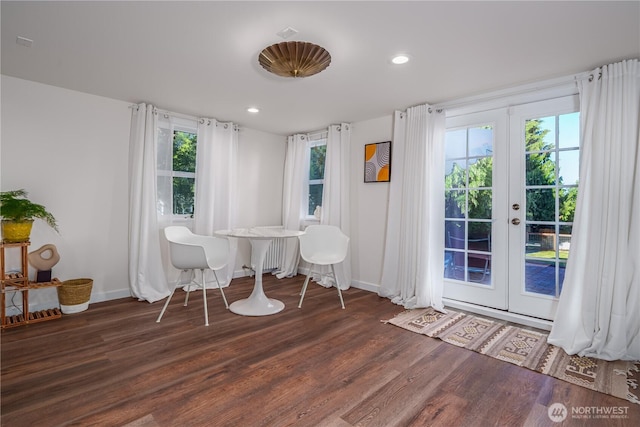 9316 7th Ave S, Seattle, WA 98108 - dining space featuring wood finished floors, baseboards, french doors, and recessed lighting
