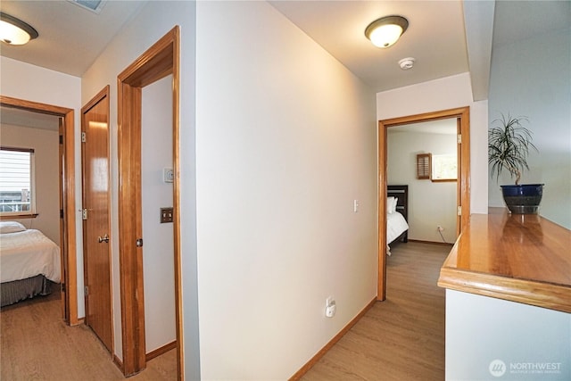 2820 V Ct SE, Auburn, WA 98002 - hallway featuring light wood-type flooring and baseboards