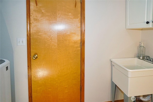 2820 V Ct SE, Auburn, WA 98002 - laundry room with cabinet space and washer / dryer