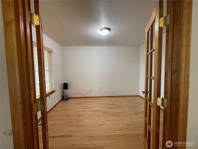 2820 V Ct SE, Auburn, WA 98002 - empty room featuring light wood finished floors, french doors, and baseboards