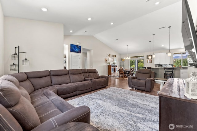 3 Kingfisher Rd, Twisp, WA 98856 - living area featuring vaulted ceiling, wood finished floors, and recessed lighting