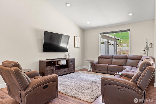 3 Kingfisher Rd, Twisp, WA 98856 - living area featuring wood finished floors, vaulted ceiling, baseboards, and recessed lighting