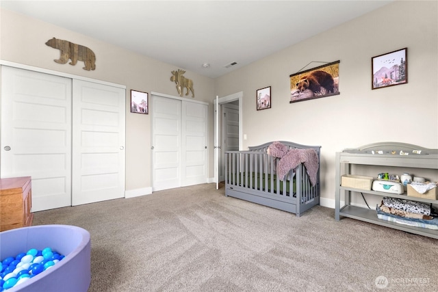 3 Kingfisher Rd, Twisp, WA 98856 - bedroom with carpet floors, two closets, and baseboards