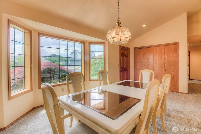 703 Tanarae Pl, Yakima, WA 98908 - dining room featuring light carpet, lofted ceiling, a chandelier, and recessed lighting