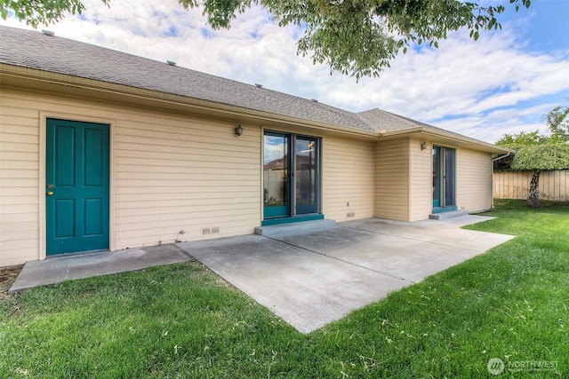 703 Tanarae Pl, Yakima, WA 98908 - back of property featuring roof with shingles and a patio
