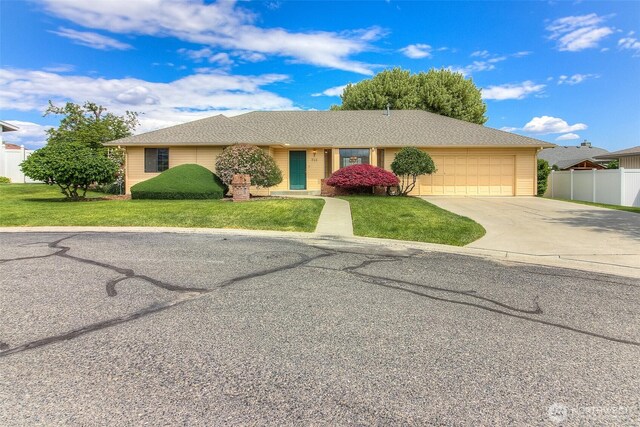 703 Tanarae Pl, Yakima, WA 98908 - ranch-style home with a garage and concrete driveway