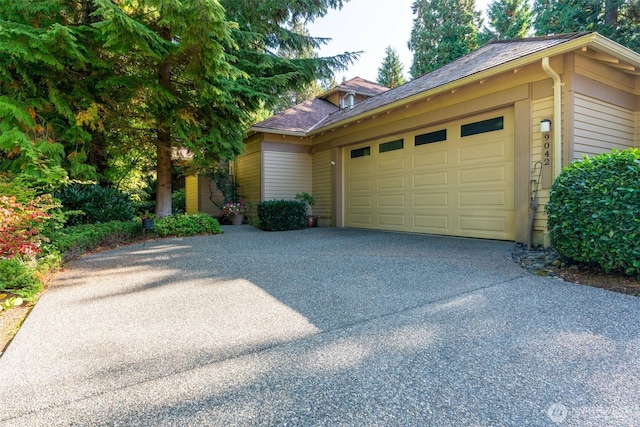 9042 Gleneagle Dr, Blaine, WA 98230 - view of front facade featuring driveway and an attached garage