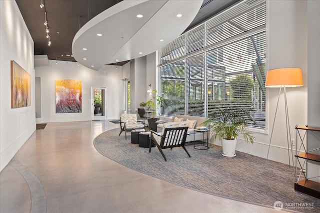 2801 1st Ave Unit 1002, Seattle, WA 98121 - common area with a towering ceiling and recessed lighting