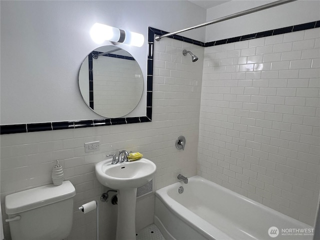 1105 Spring Unit 1309, Seattle, WA 98104 - bathroom with toilet, tub / shower combination, and a sink