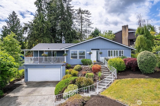 4025 Somerset Ln, Kent, WA 98032 - view of front of house featuring driveway, a garage, and a front lawn