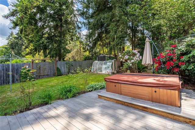 4025 Somerset Ln, Kent, WA 98032 - wooden terrace with a covered hot tub, a greenhouse, and an outbuilding