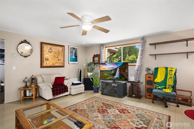 7431 S 132nd St, Seattle, WA 98178 - living area with wood finished floors and ceiling fan