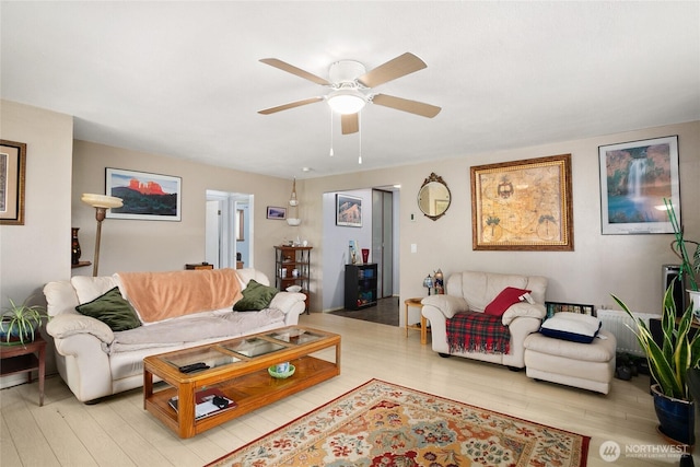 7431 S 132nd St, Seattle, WA 98178 - living room with a ceiling fan and light wood finished floors